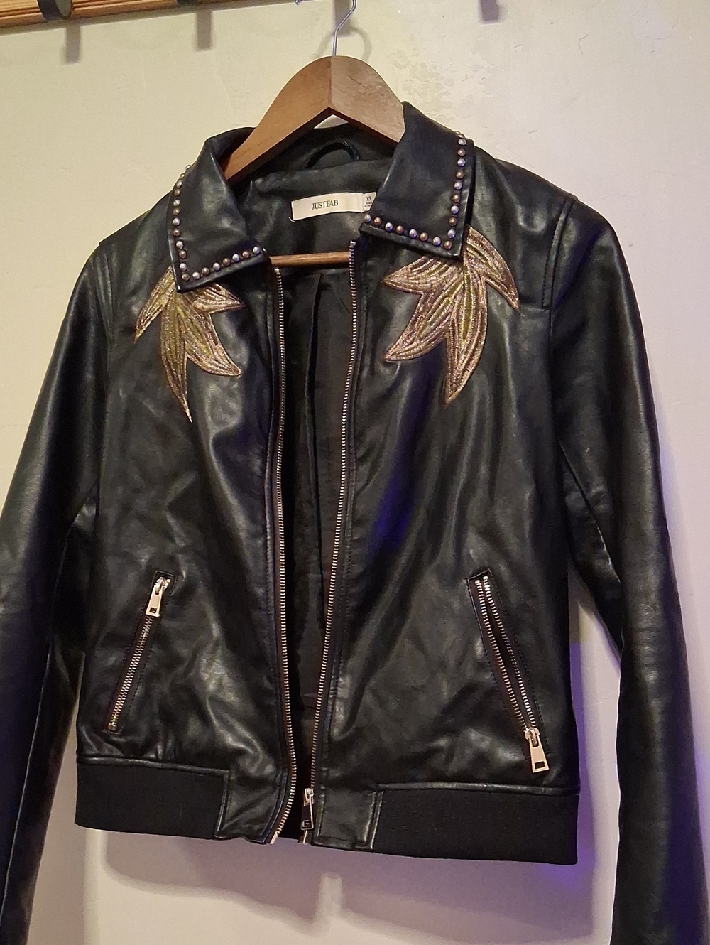 JustFab Black Faux Leather Jacket with Gold Embroidered Leaf Accents